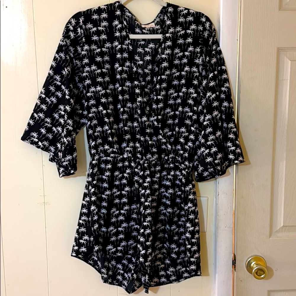 Women’s black and white palm tree romper